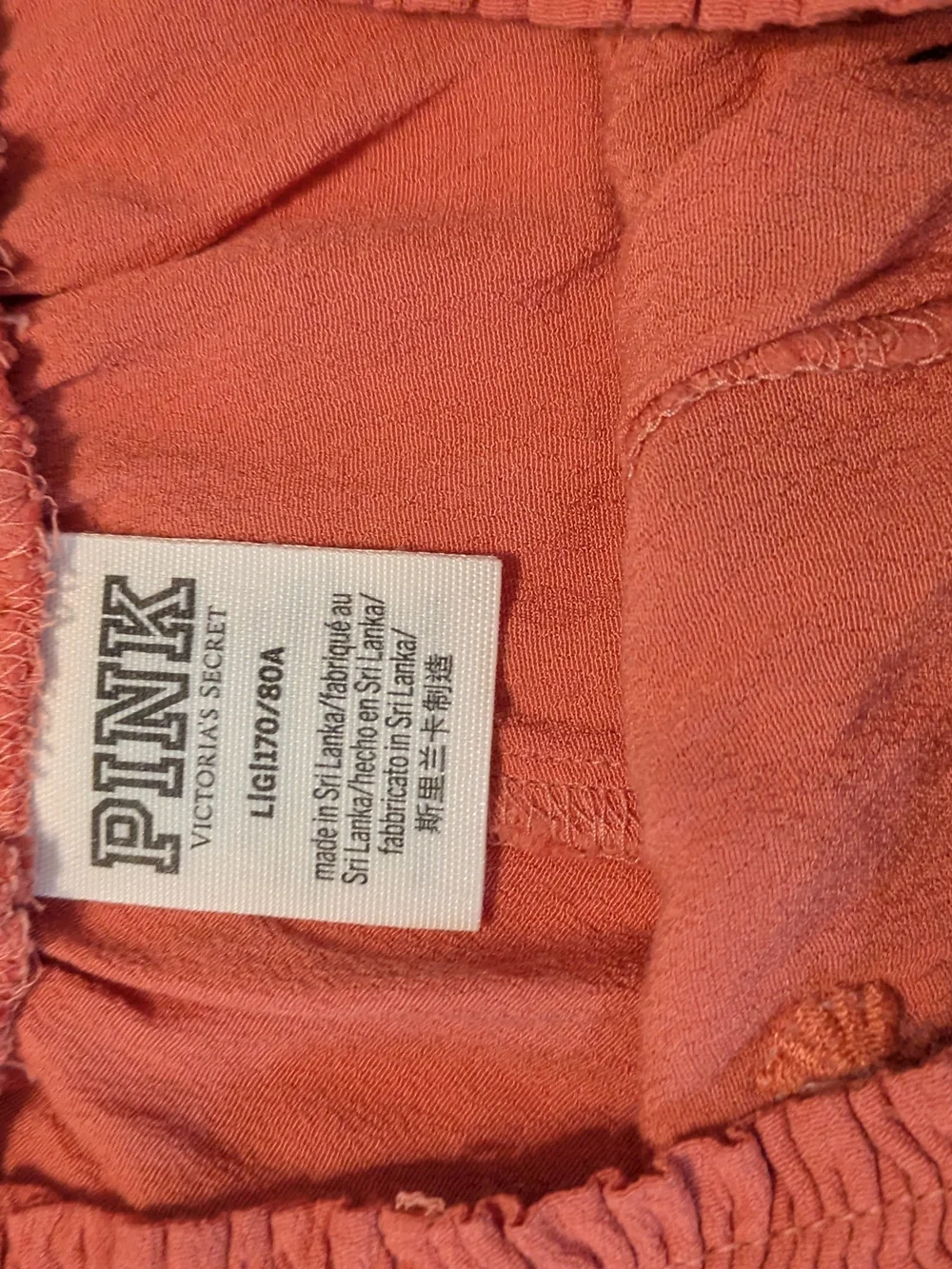 PINK Victoria's Secret Coral Smocked-Waist Embroidered Shorts